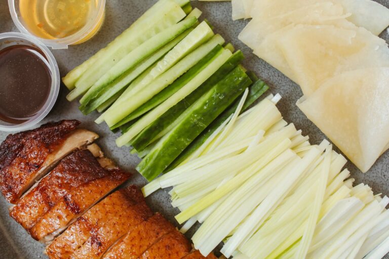 Peking duck with pancakes, cucumber and spring onion