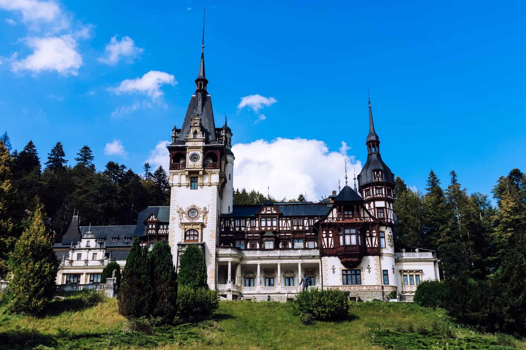Peleș Castle among pine trees, Romania