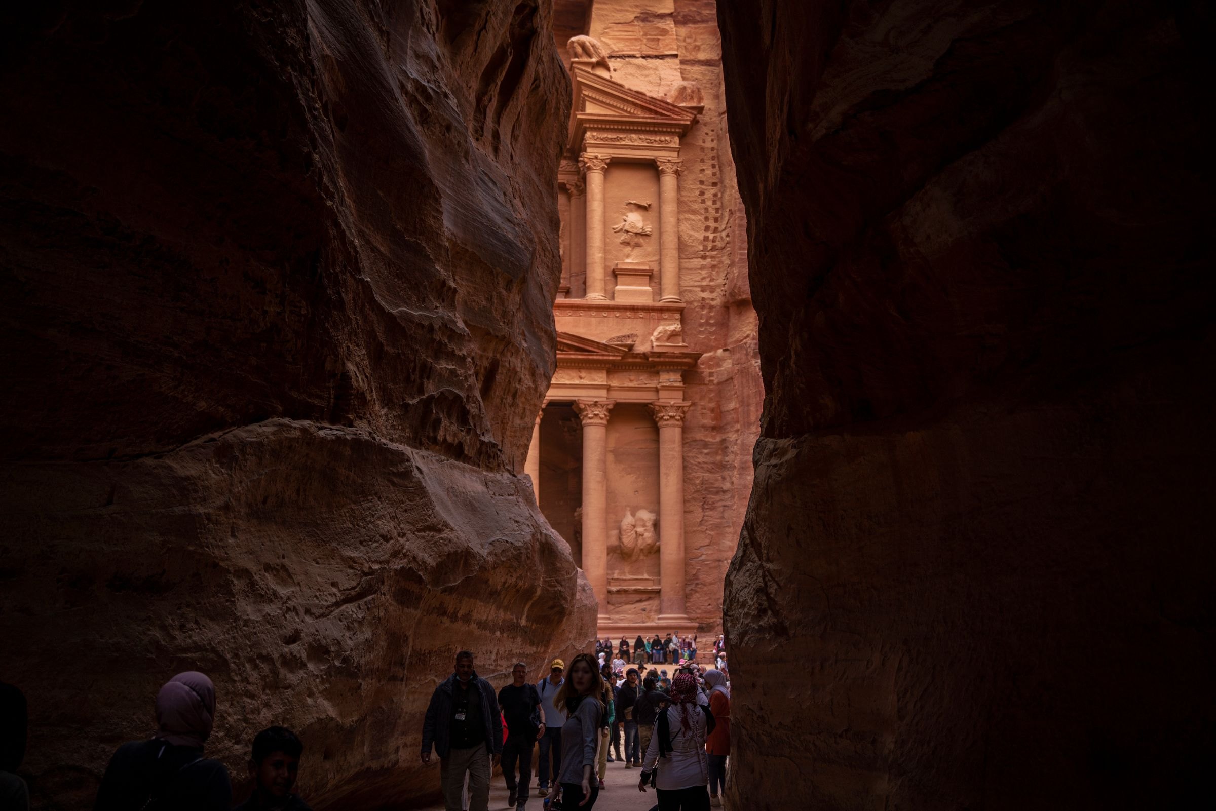 Walking through the Siq towards the Treasury in Petra