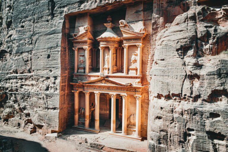 The Treasury carved into the sandstone at Petra