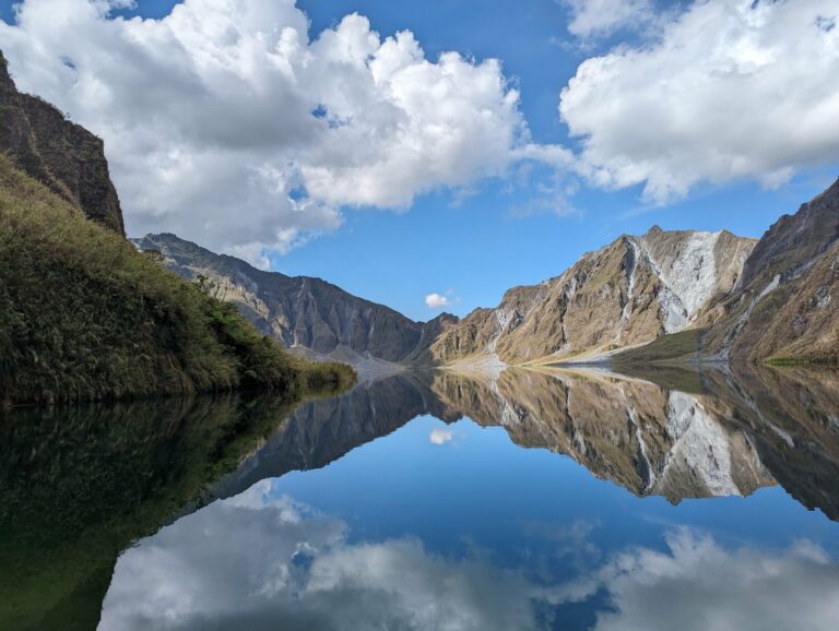 Mountains reflected in Pinatubo crater lake