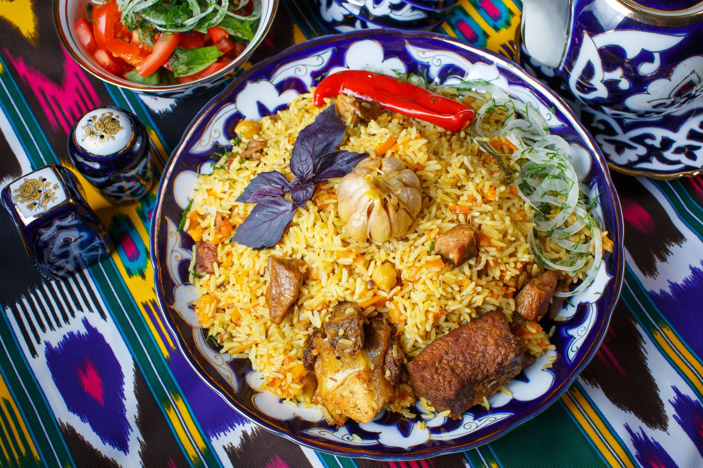 A plate of plov on a decorated dish