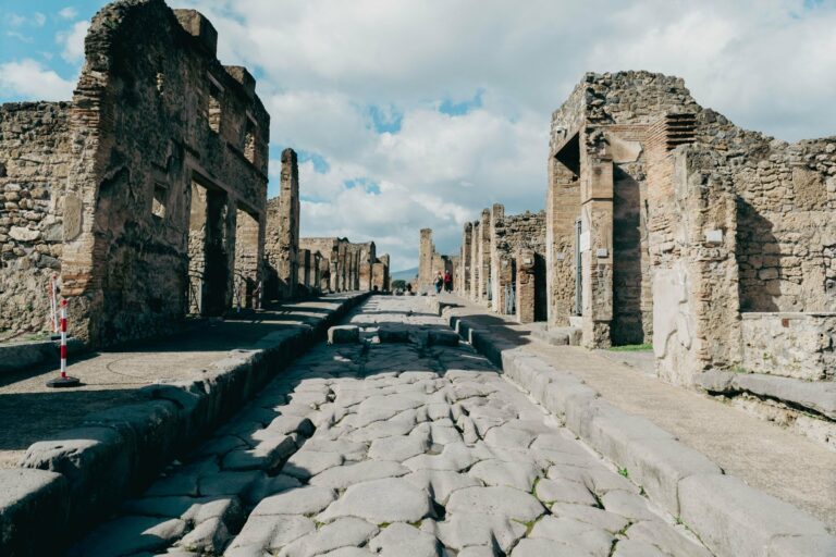 A paved Roman street through the ruins of Pompeii