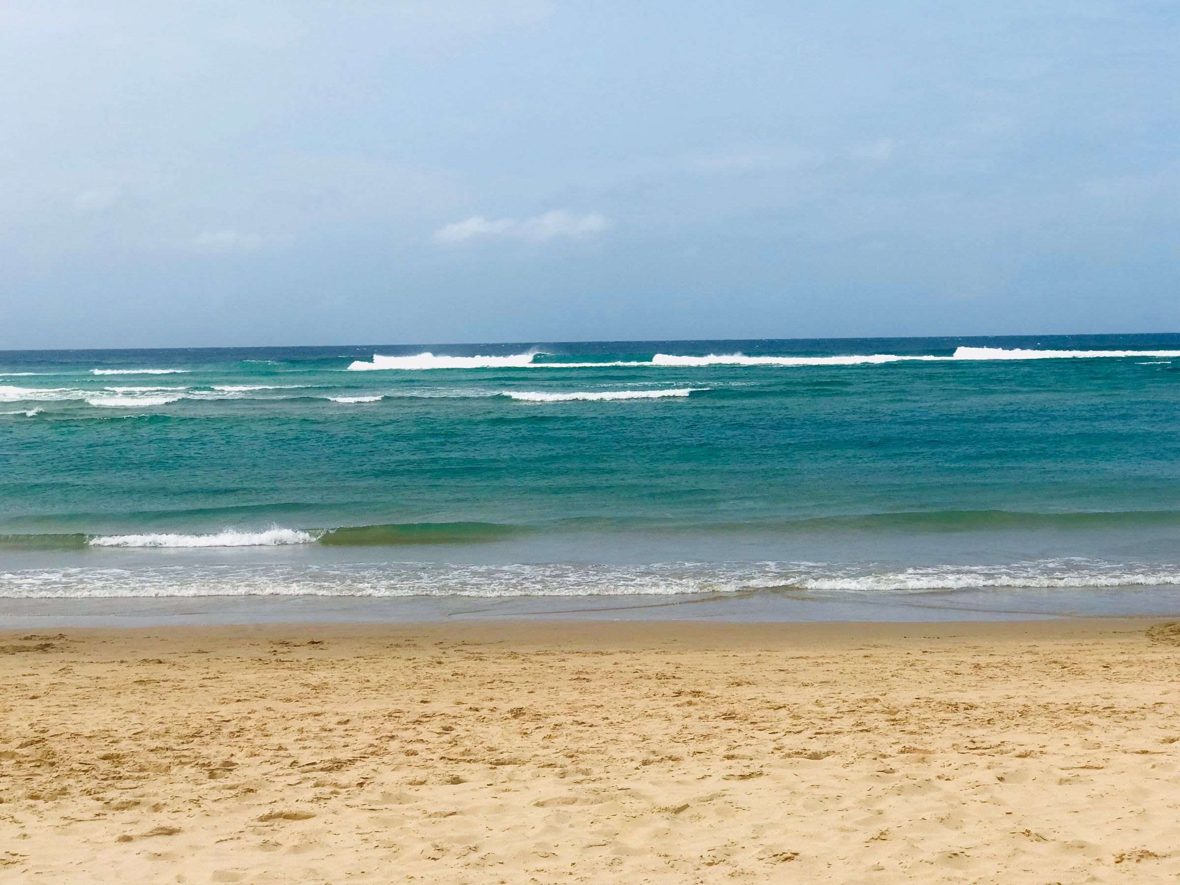 The beach and turquoise sea at Ponta do Ouro, Mozambique