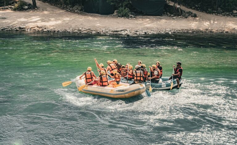 A group rafting through white water