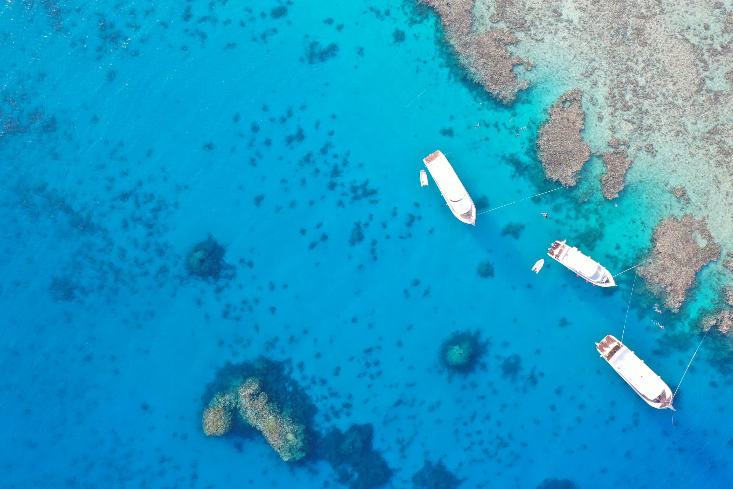 Boats moored over Red Sea reefs off Hurghada