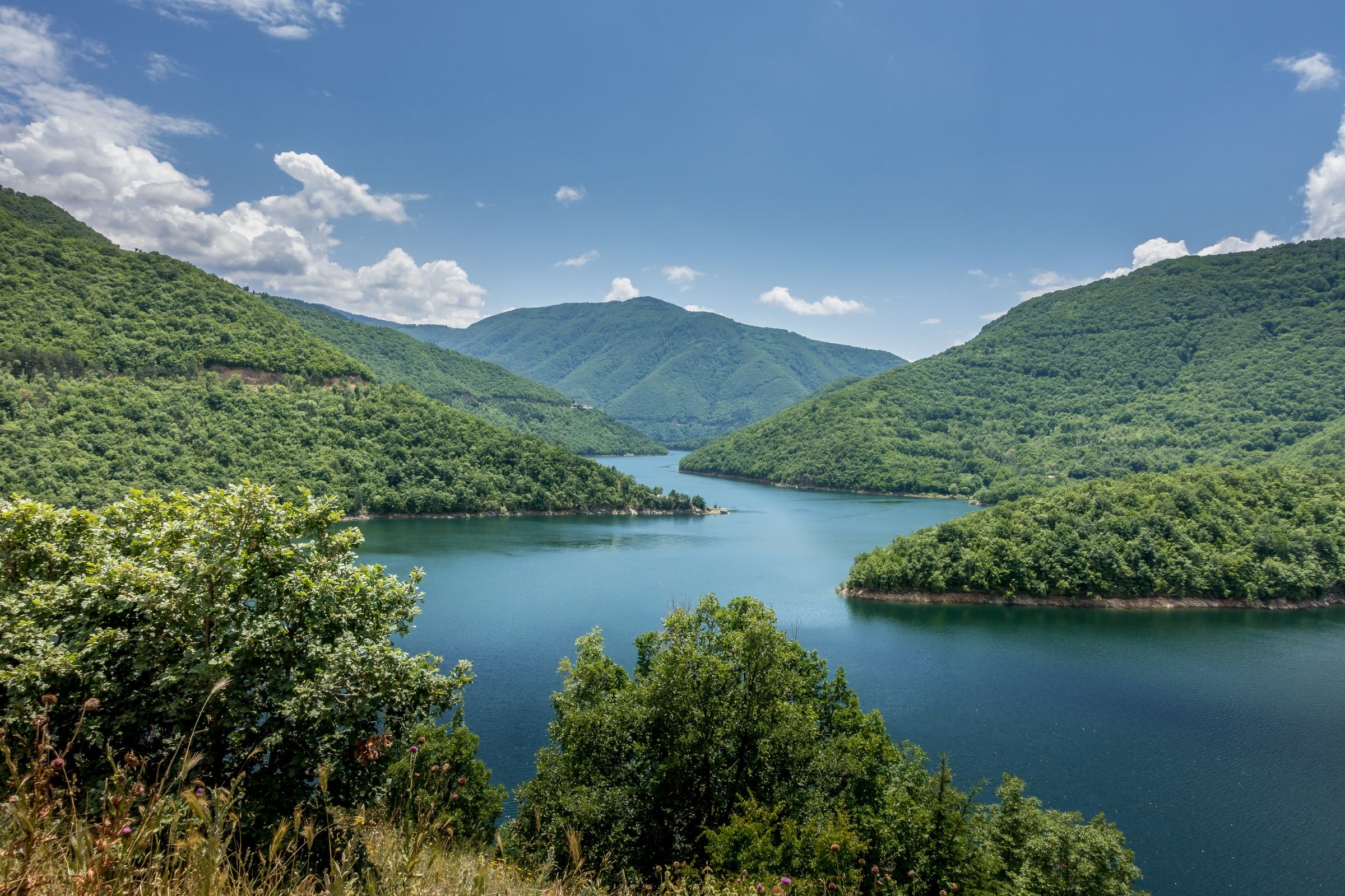 A reservoir among the green Rhodope Mountains