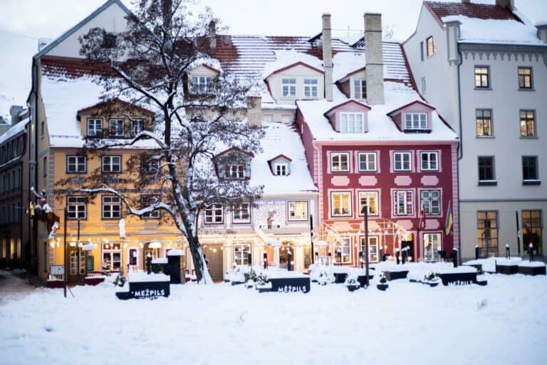 Snow-covered facades on a square in Riga's Old Town, Latvia
