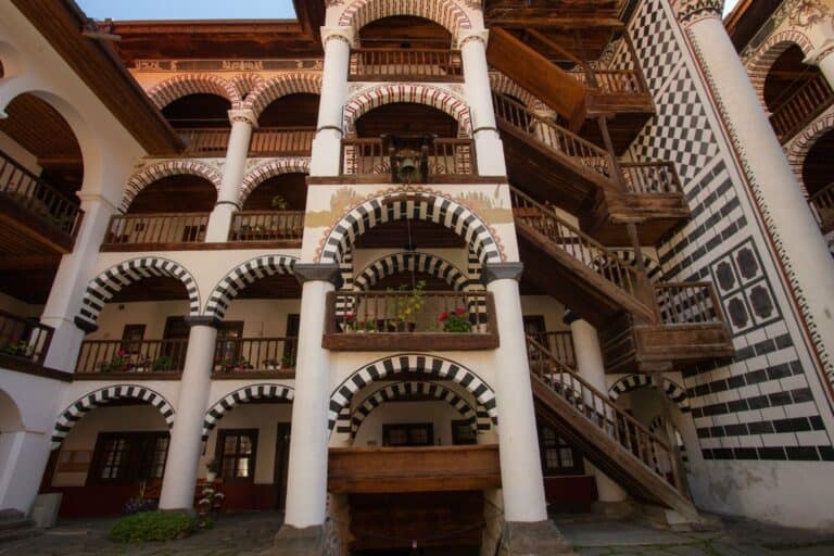 The striped arches and balconies of Rila Monastery