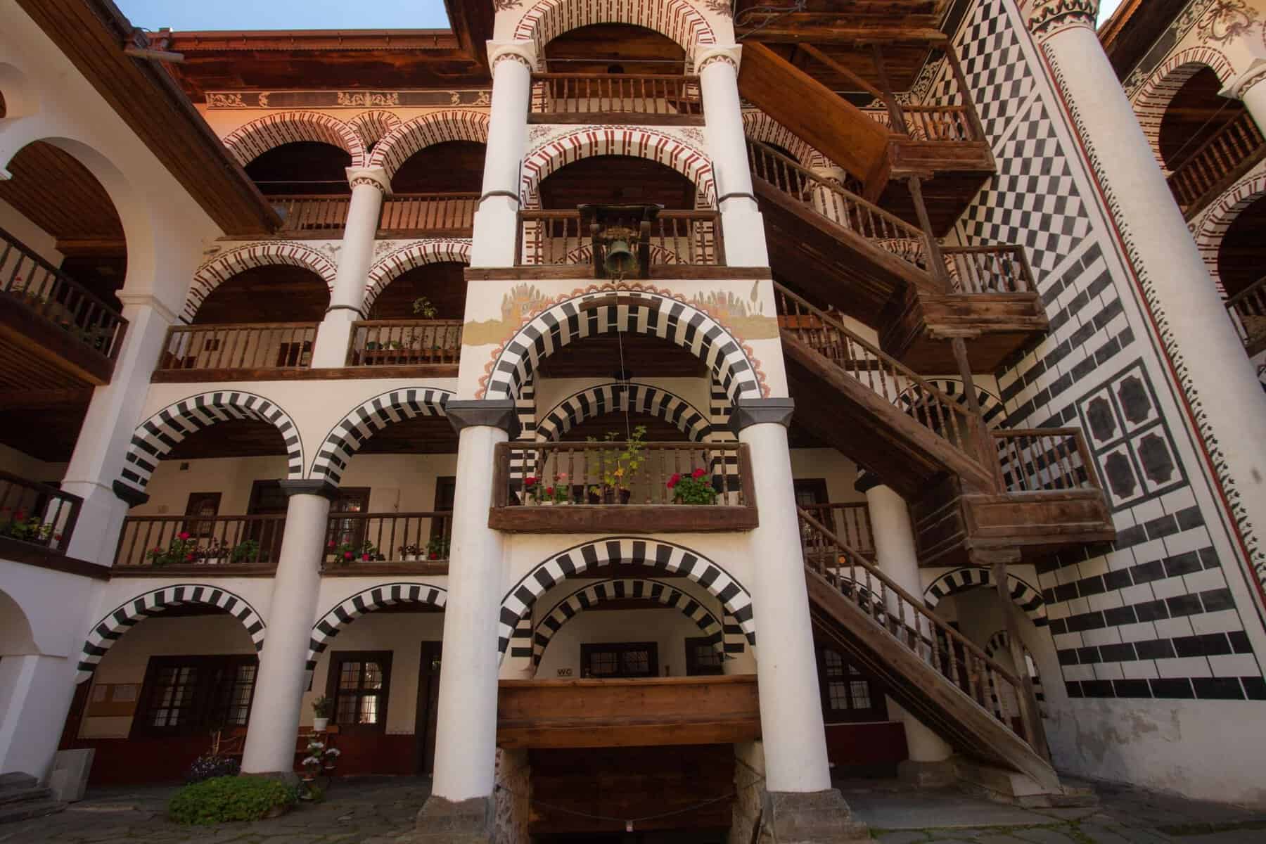 The striped arches and balconies of Rila Monastery
