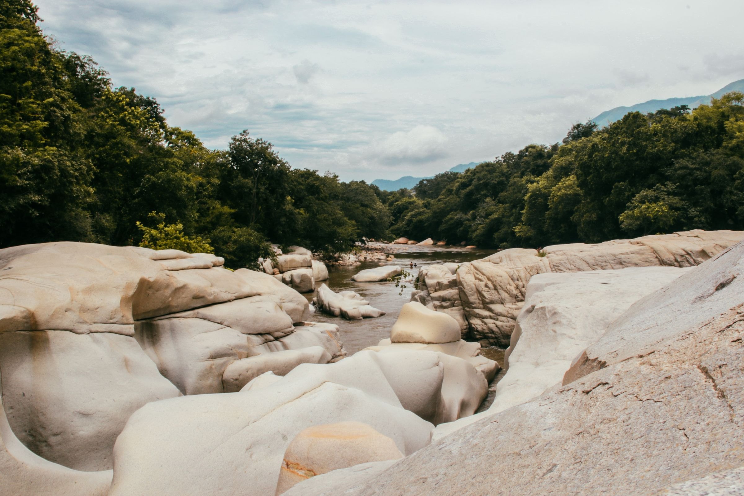 A river through rocks and forest