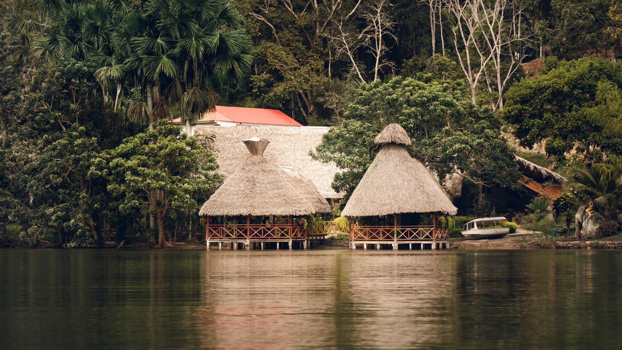 Thatched huts on the Río Dulce