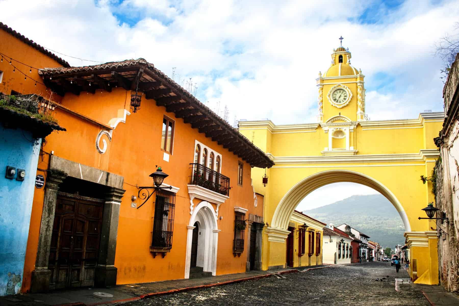 The Santa Catalina Arch on a colourful street in Antigua, Guatemala