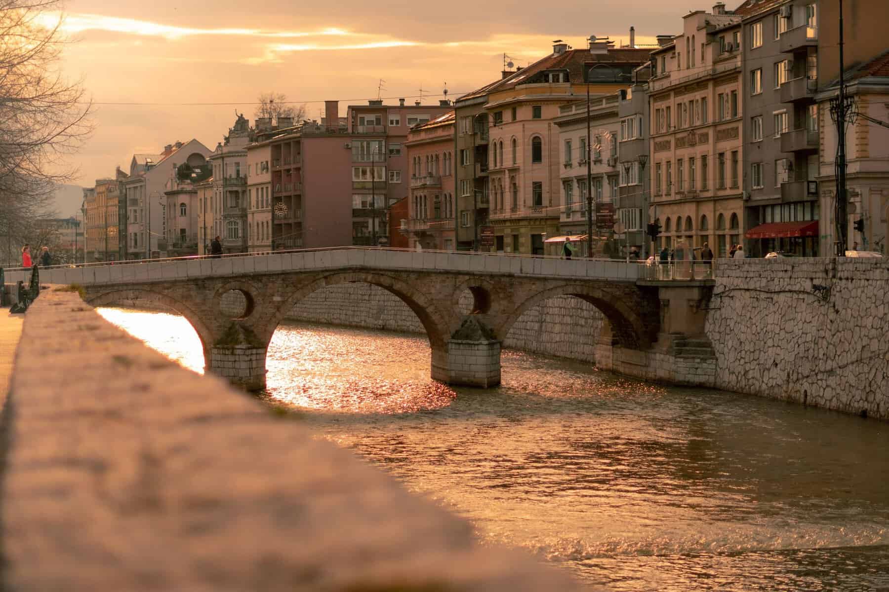 The Latin Bridge over the Miljacka River in Sarajevo at sunset