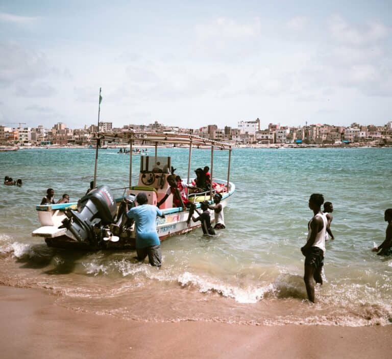 Fishermen bringing in their catch on the coast of Senegal
