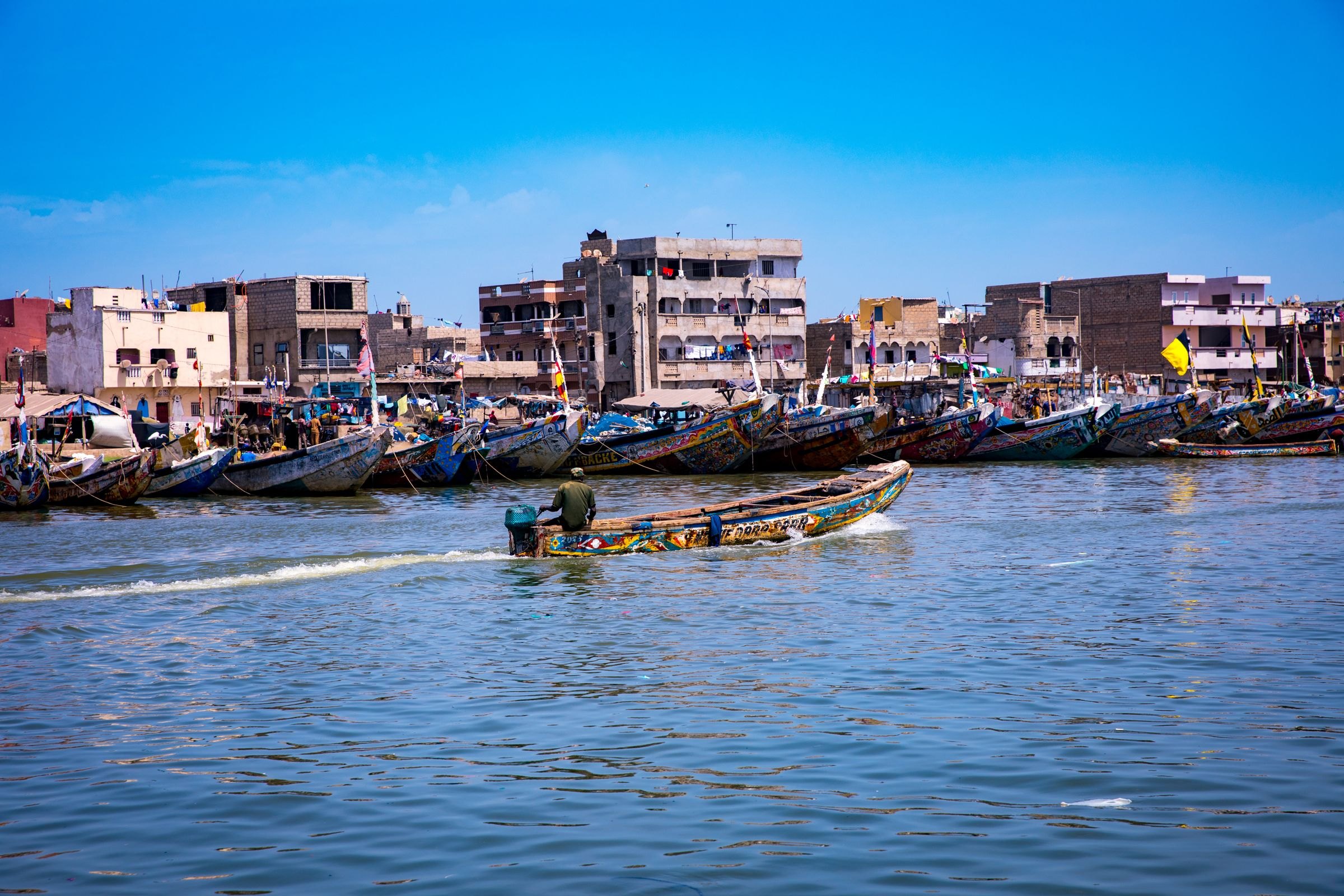 Painted fishing boats along the Senegalese coast