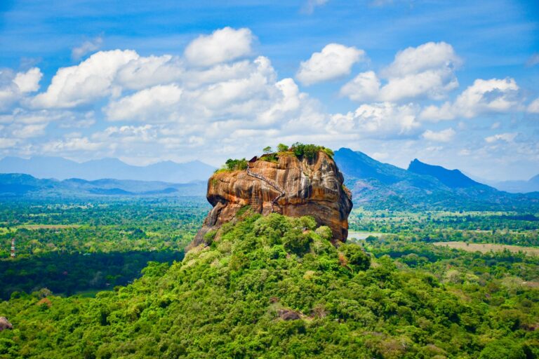 Sigiriya's Lion Rock above the forest