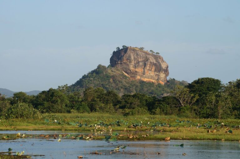 Sigiriya Rock rising above the water