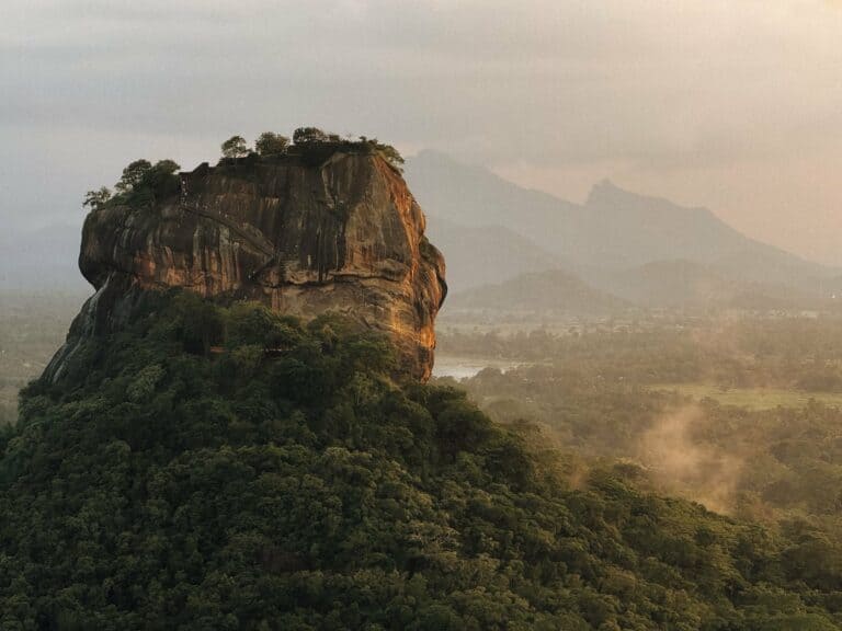 Sigiriya, the Lion Rock fortress, rising above the forest in Sri Lanka