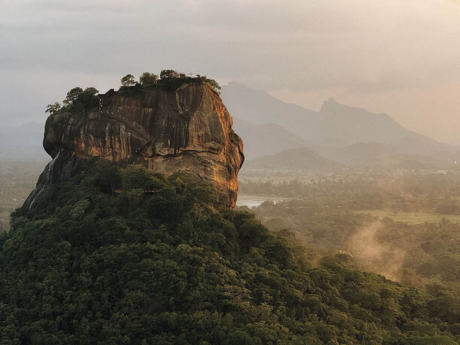 Sigiriya, the Lion Rock fortress, rising above the forest in Sri Lanka