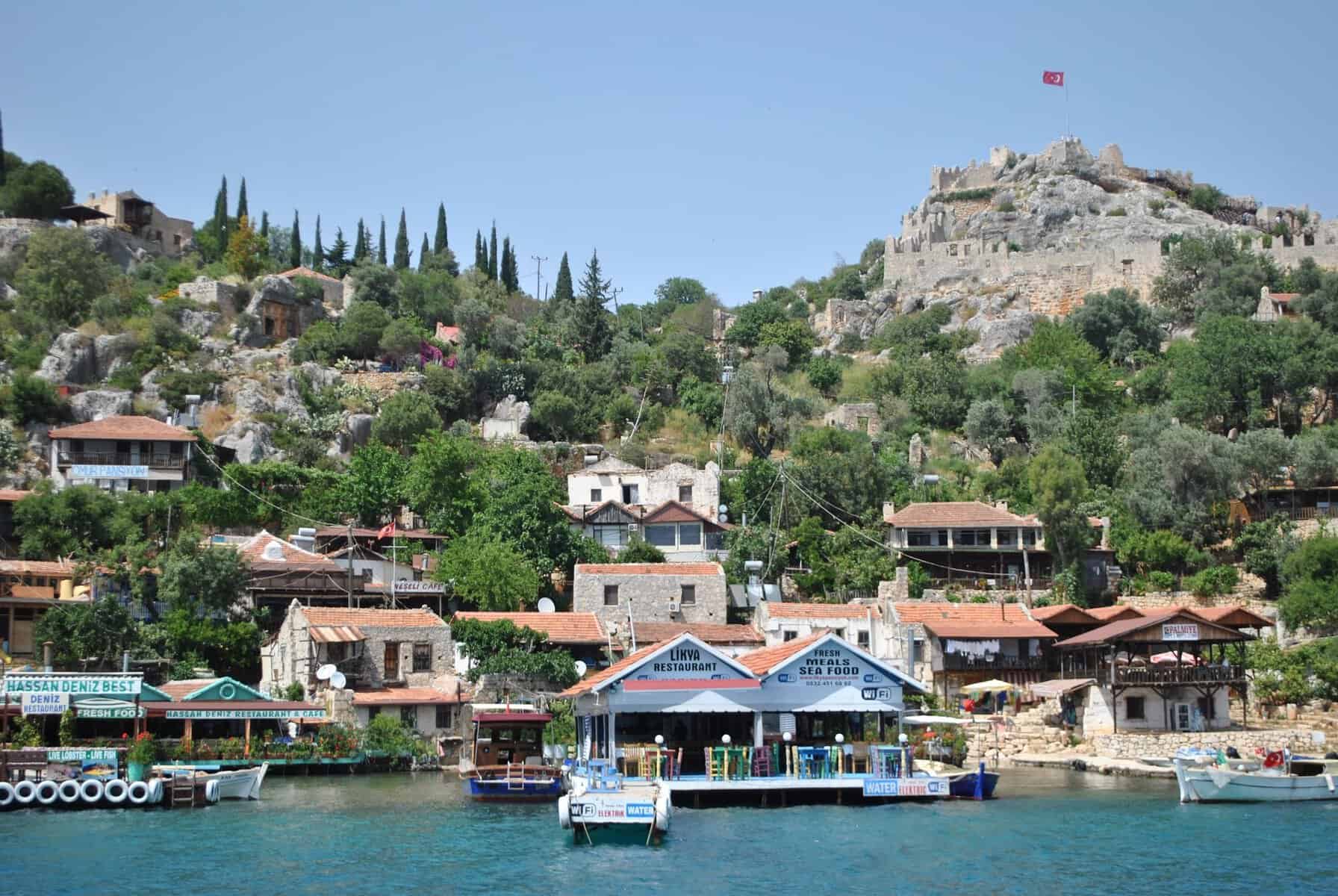 Simena Castle above the waterfront village of Kaleköy, Turkey