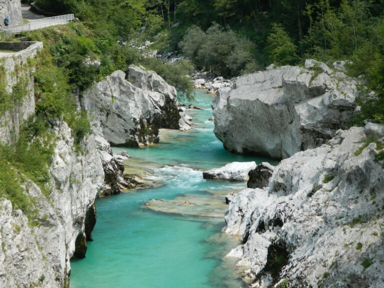 The turquoise Soca River between rocks