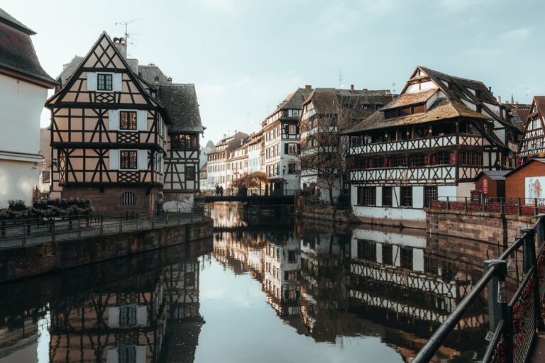 Half-timbered houses reflected in a canal in Strasbourg