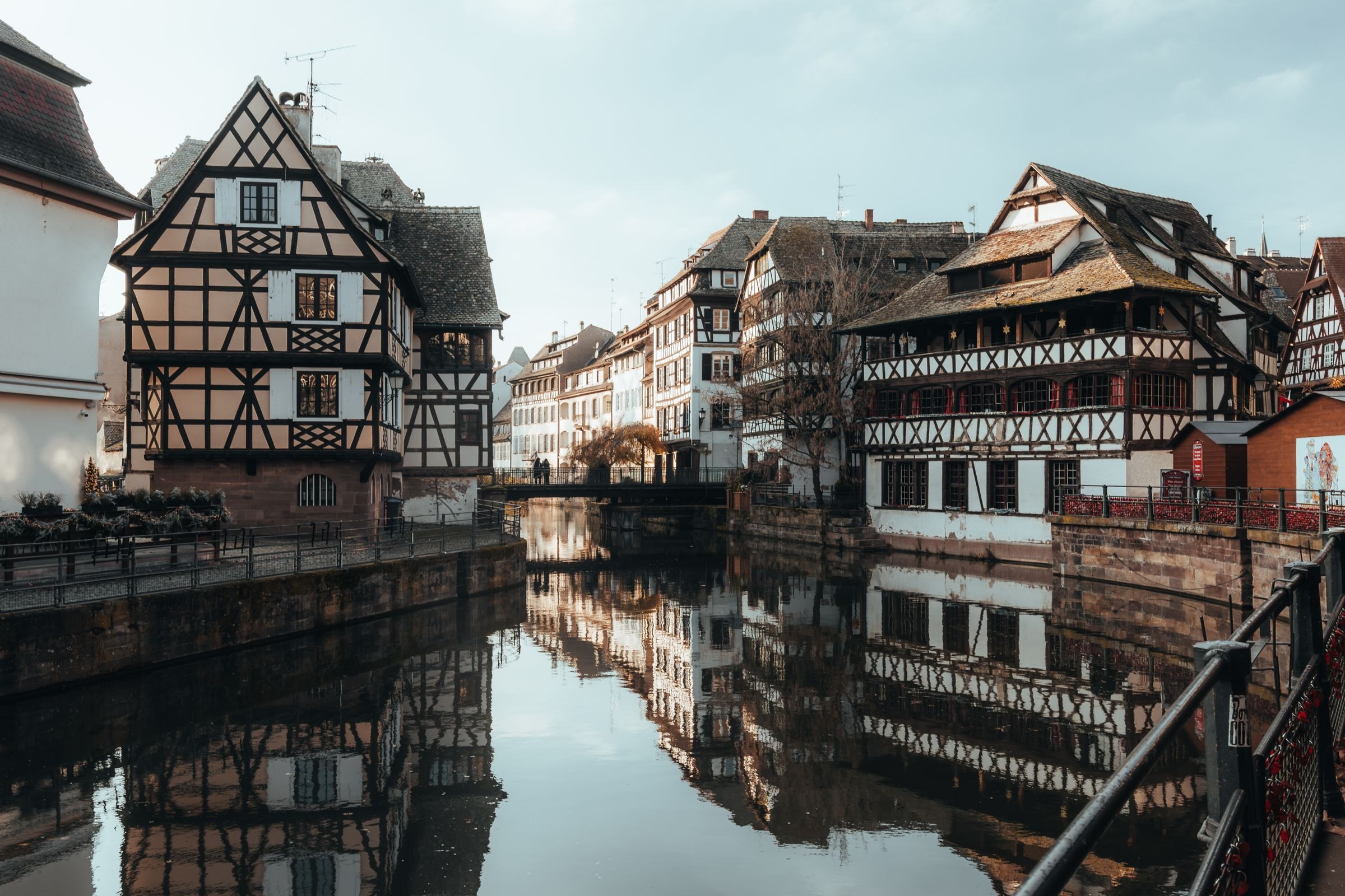 Half-timbered houses reflected in a canal in Strasbourg