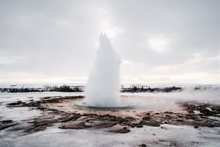 The Strokkur geyser erupting in winter