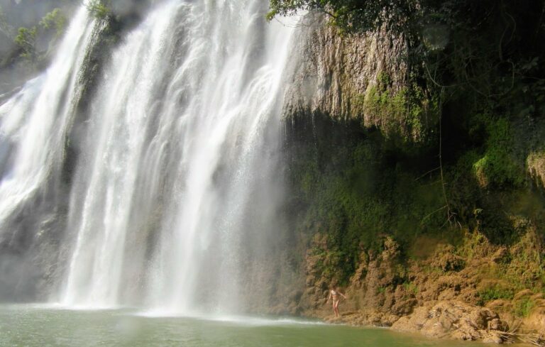 A waterfall cascading over rocks in northern Thailand