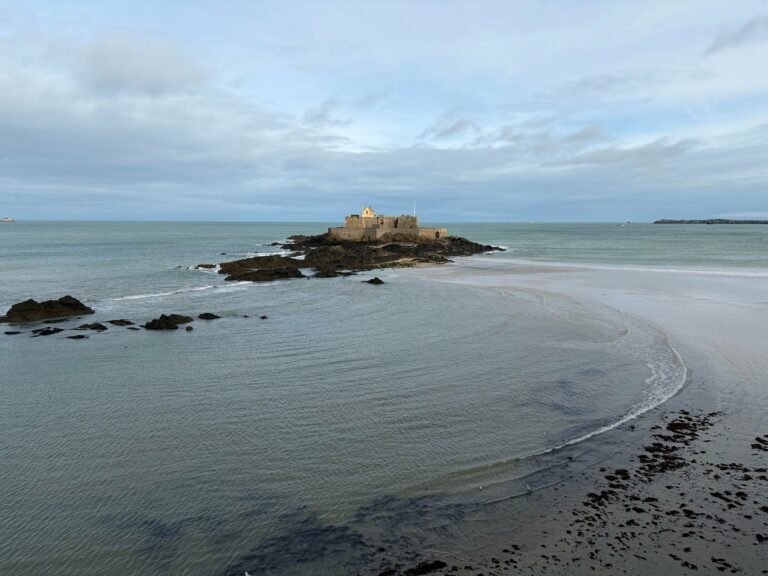 A fort on a tidal island at low tide