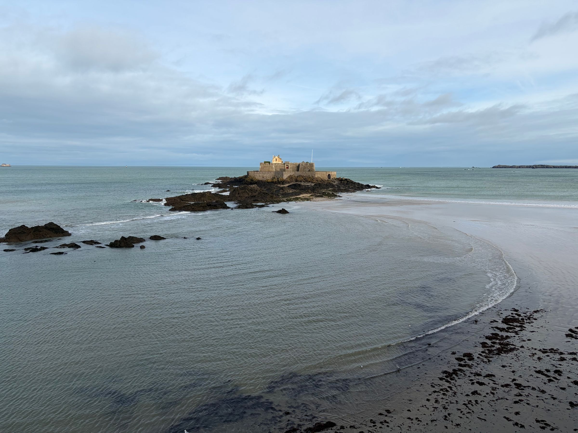 A fort on a tidal island at low tide