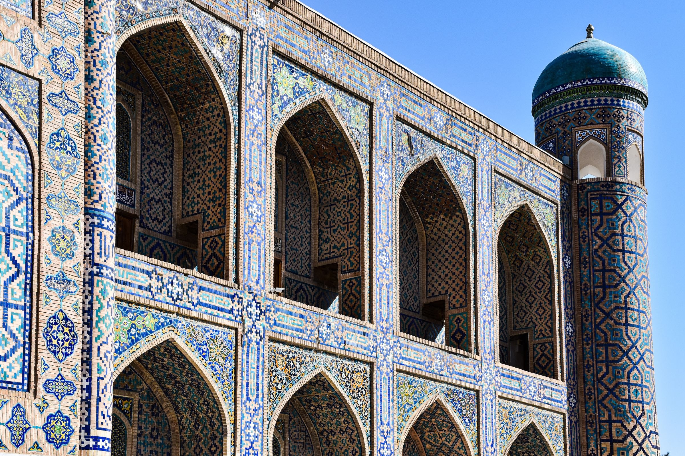 The tiled facade of the Tilya-Kori Madrasa