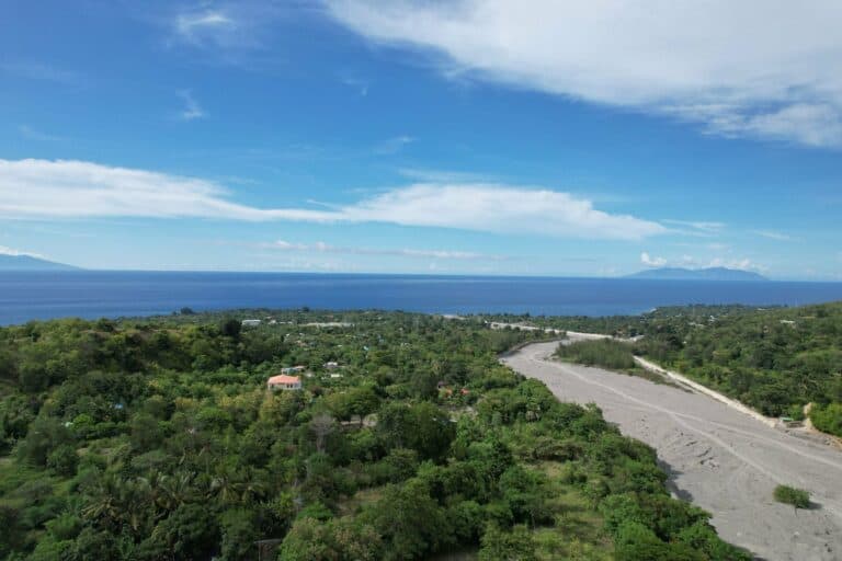Green countryside and the sea near Liquiçá, Timor-Leste