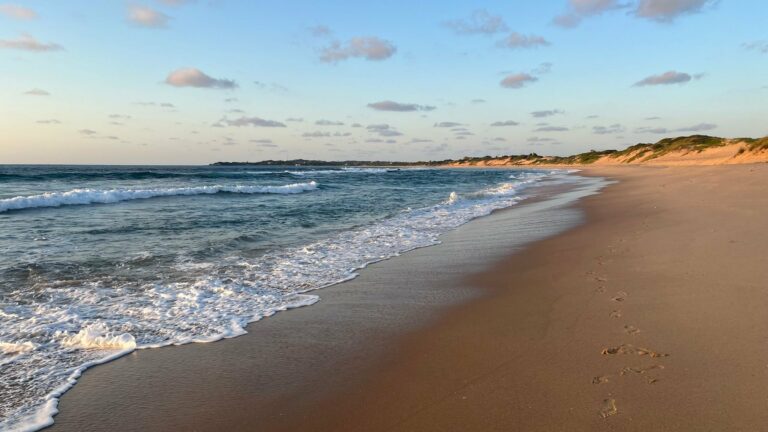 Waves on Tofo Beach, Mozambique, at sunset