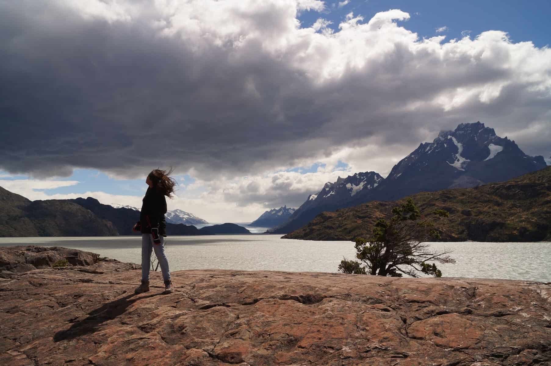 A traveller overlooking the Torres del Paine landscape