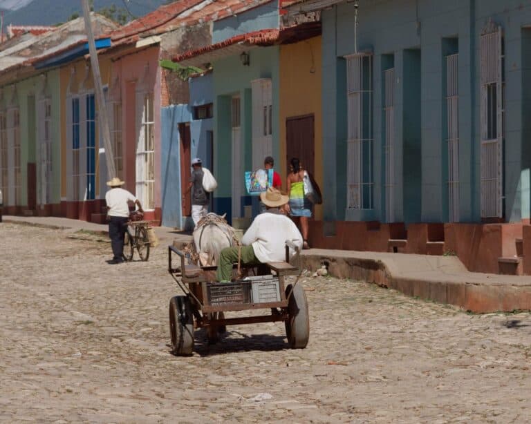 A horse-drawn cart on a cobbled street in Trinidad, Cuba