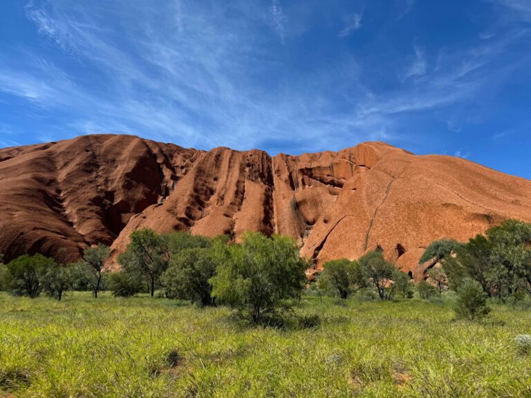 Uluru under a clear blue sky