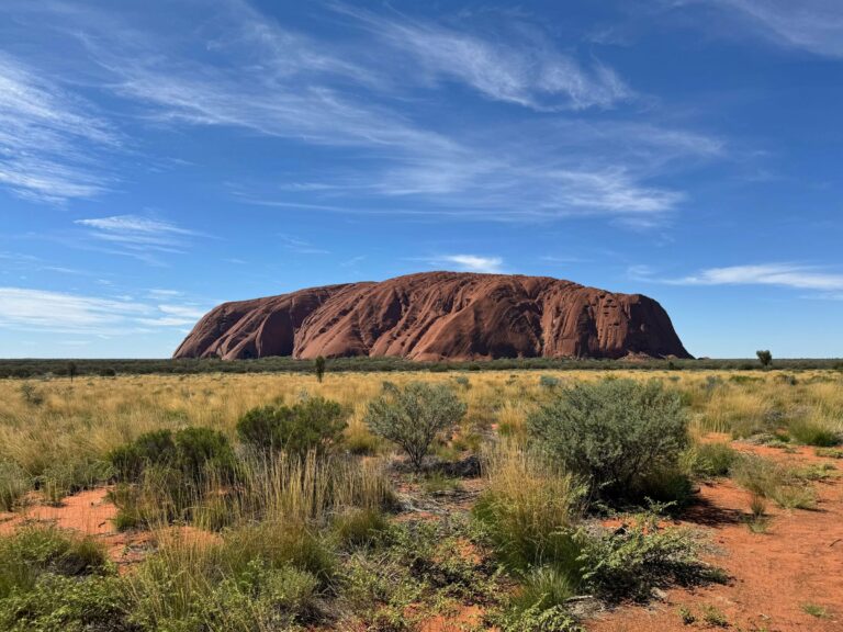 Uluru rising above the desert