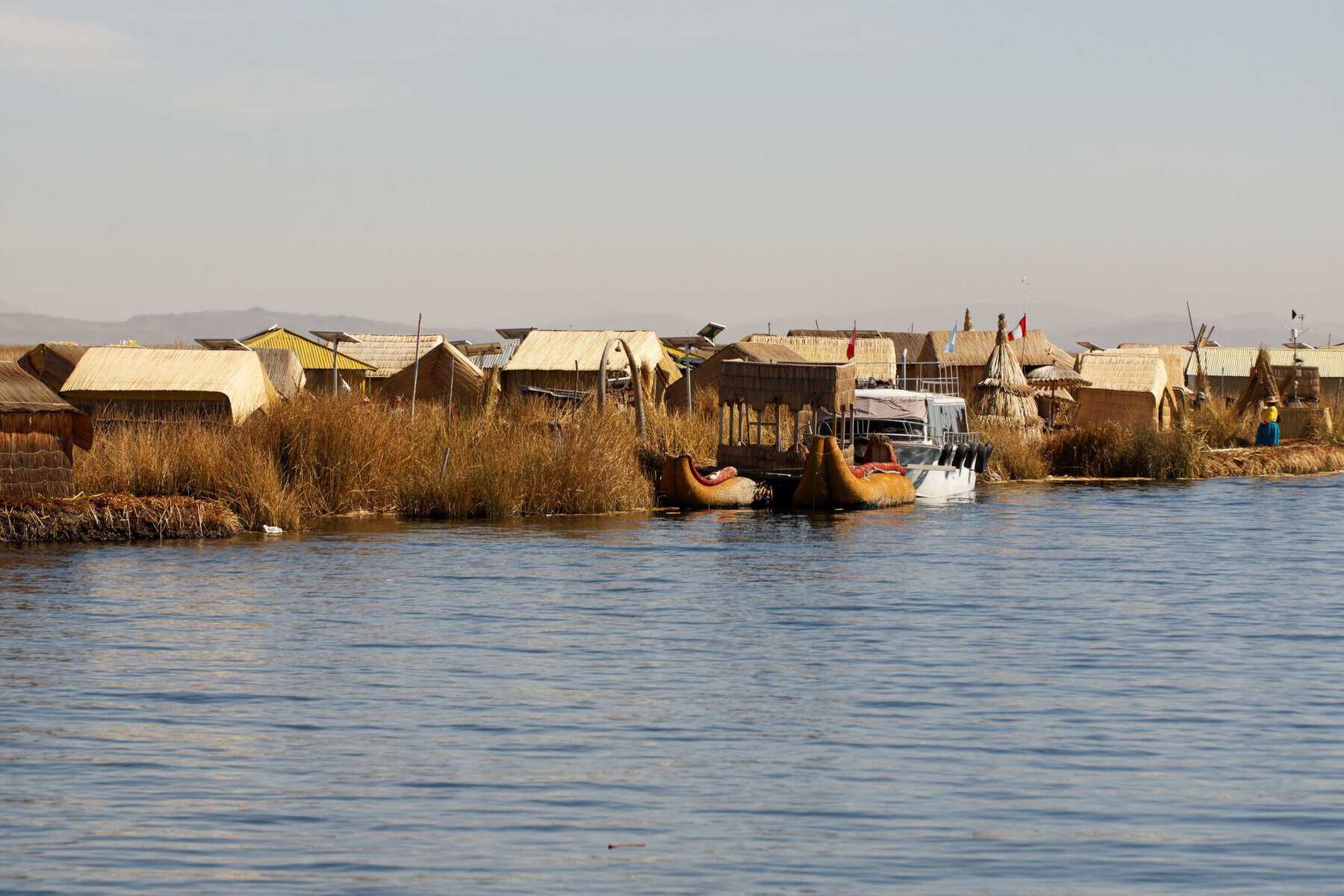 Reed houses of a Uros floating village on Lake Titicaca