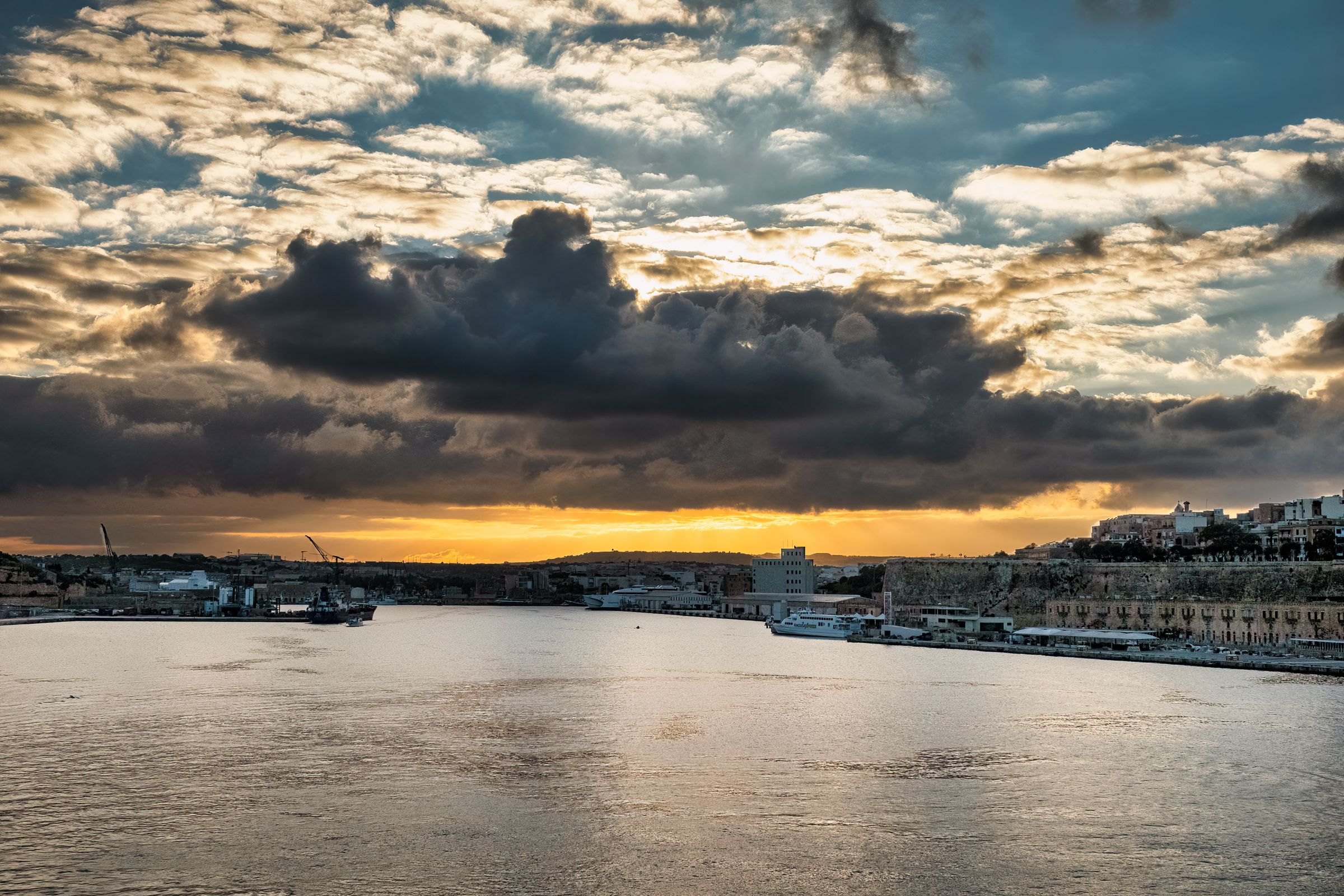 Sunset over Valletta's harbour