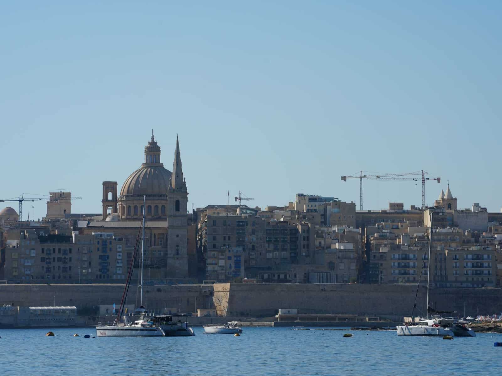 Valletta's skyline and dome across the harbour, Malta