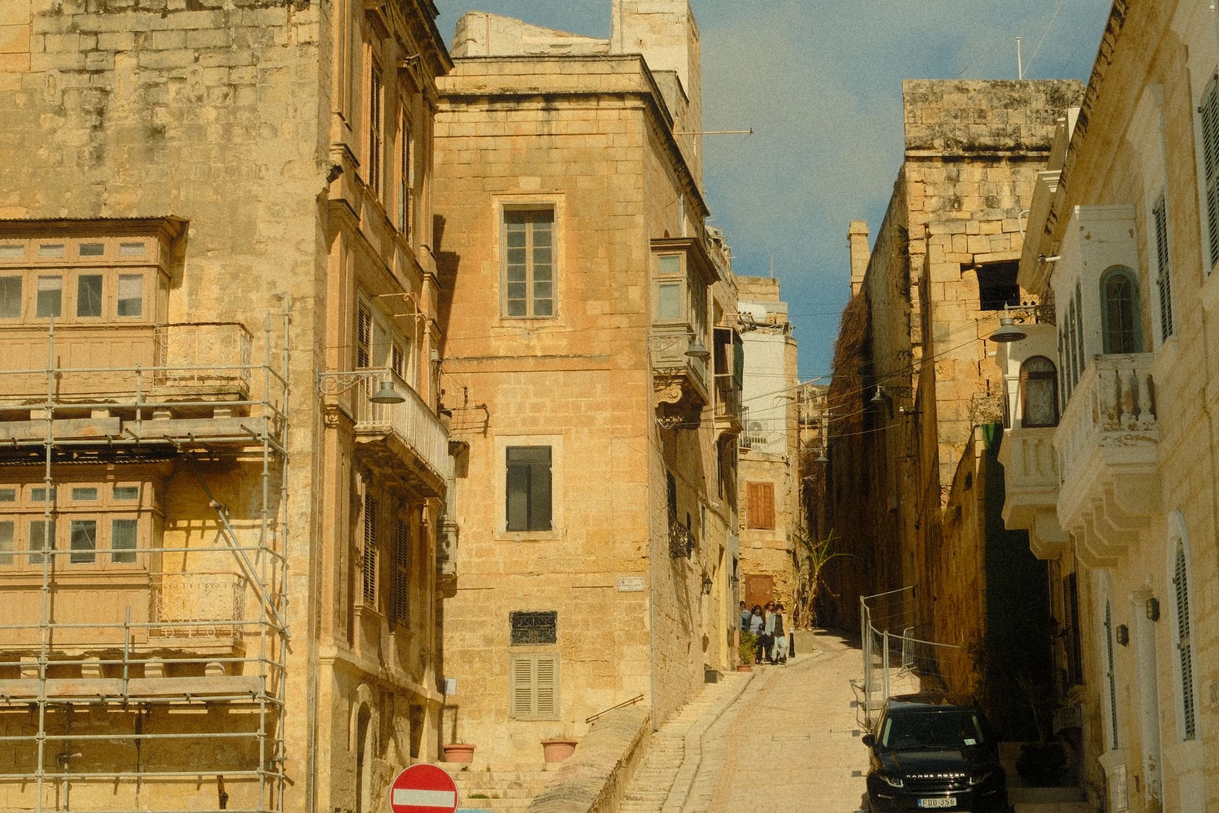 A sunlit street in Valletta