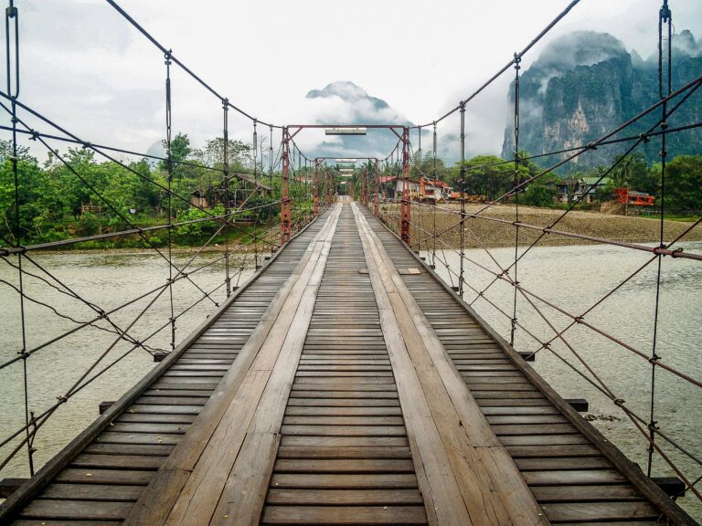 A wooden suspension bridge in Vang Vieng