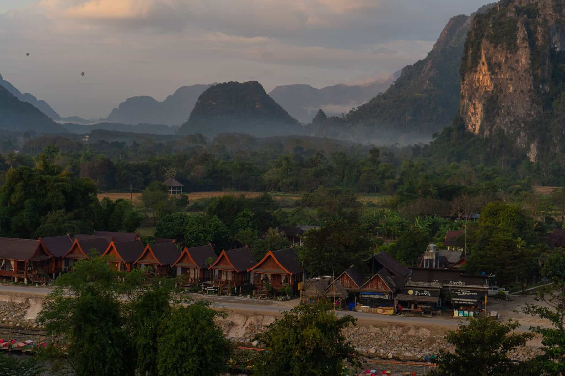 Vang Vieng beneath limestone karsts, Laos
