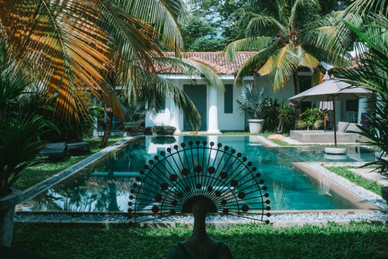 A tropical villa with a pool