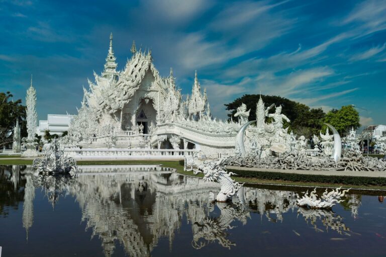 The White Temple in Chiang Rai reflected in its pond