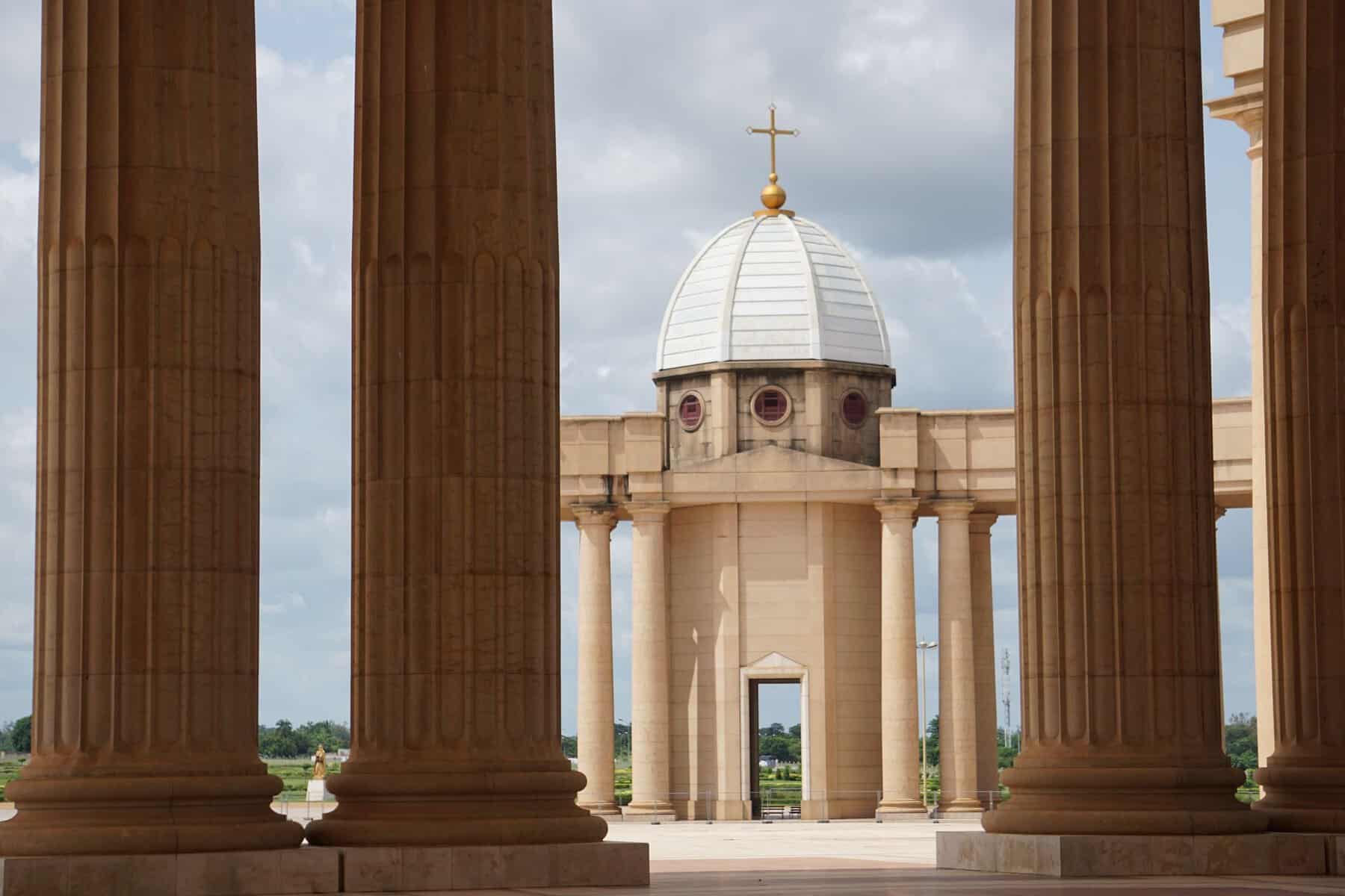 The dome of the Basilica of Our Lady of Peace framed by its columns, Yamoussoukro