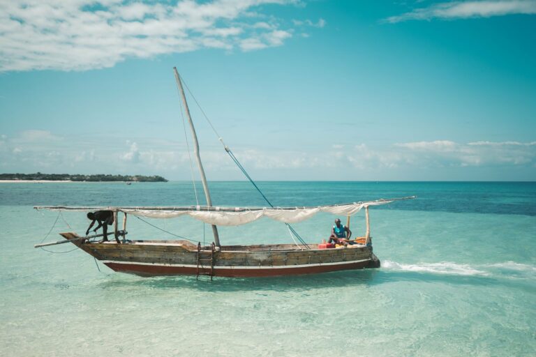 Fishermen sailing a dhow off Zanzibar