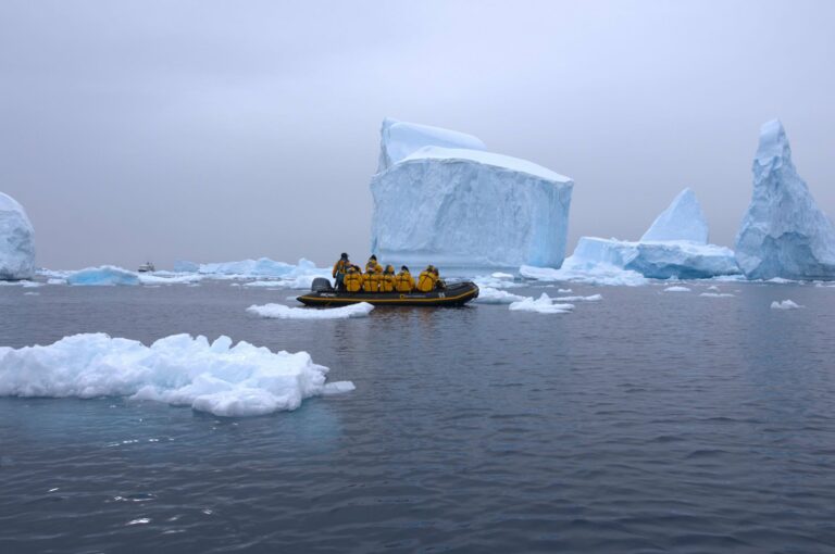 A Zodiac among icebergs
